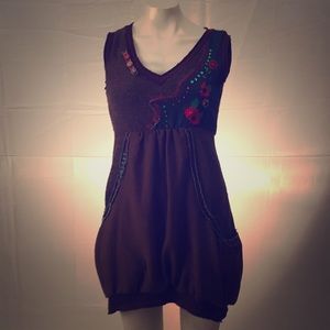 Unique sweater dress with fun embroidery detailing